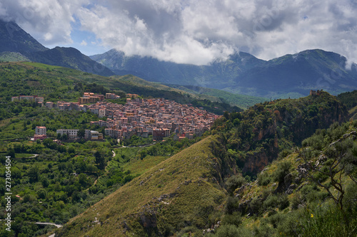 Landscape Picture of beautiful small mediaeval town or village Isnello to be located in Madonie mountain range in Italy in Palermo Province of island Sicily. Picture is taken in cloudy spring day.