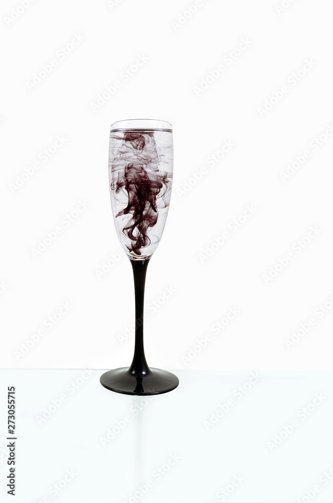 Obraz premium glass black wine white background close up fougere paint smoke streak