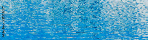 blue water texture in a pool, closeup
