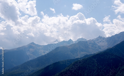 Mountain peaks on a background of clouds in Georgia