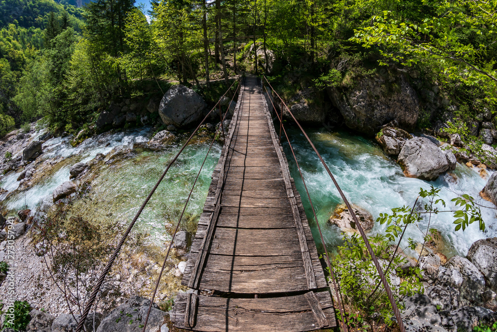 Bridge over the Soca river at the Julian Alps Bridge over the Soca river at the Julian Alps