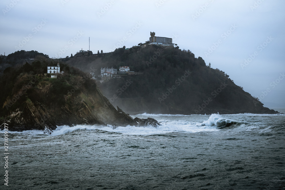 Big waves crashing against the coastline Big waves crashing against the coastline