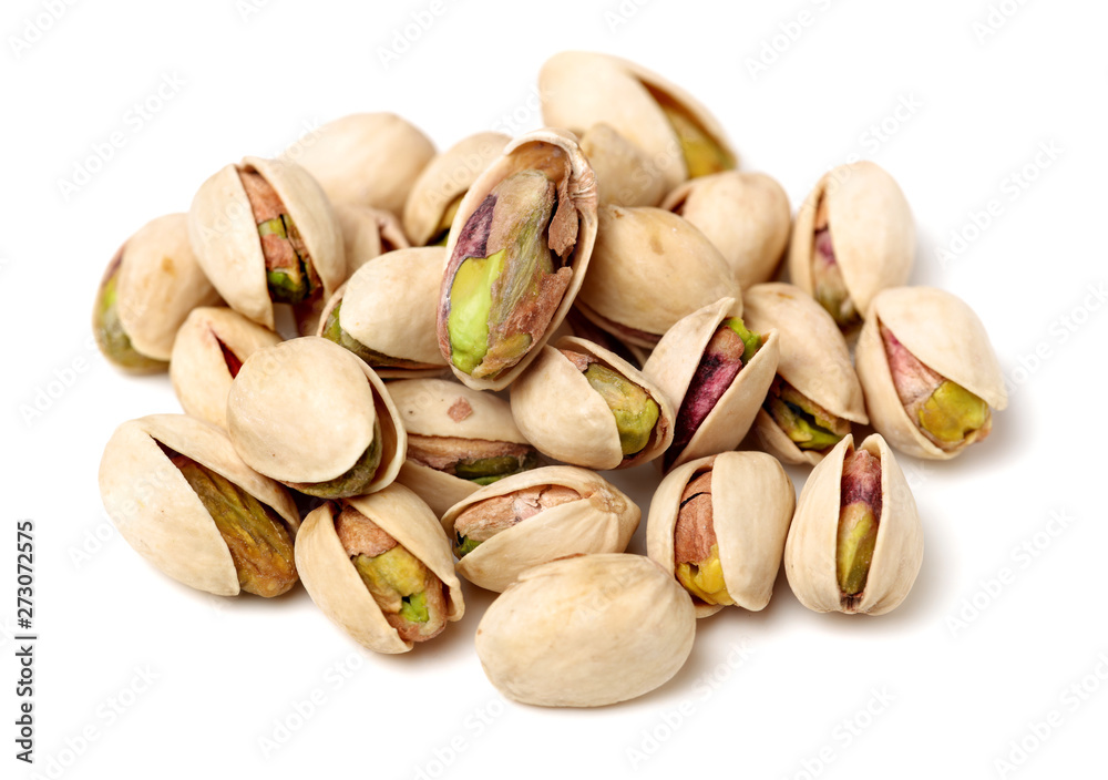 Many pistachio on white background 