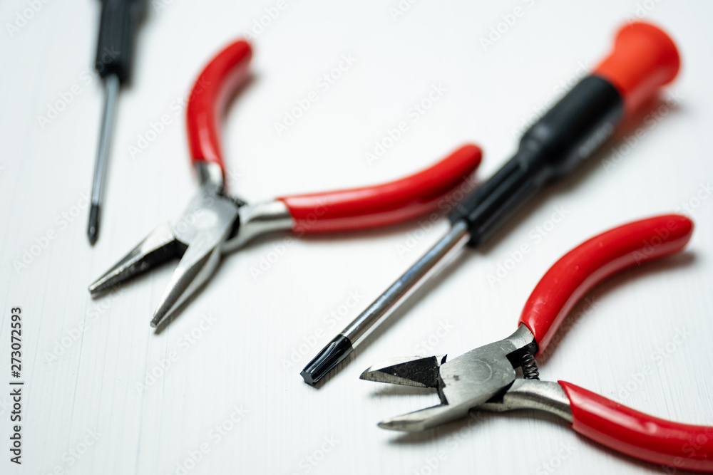 Close up of tools for repair electronics and other precision work on the white background. Close up of tools for repair electronics and other precision work on the white background.
