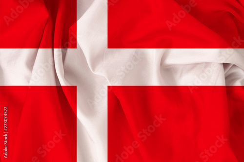 Free Download beautiful national flag of Denmark on soft silk with soft folds, close-up, copy space - GFXLoad
