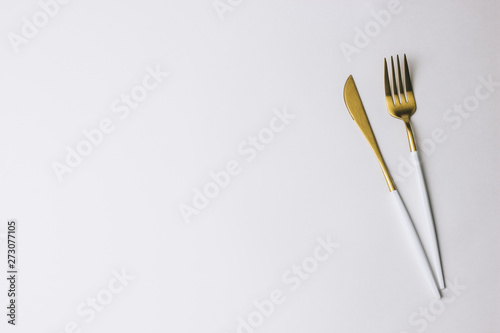 Fork and knife on white background.