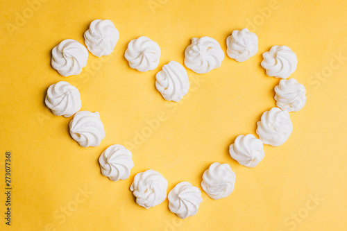 Merengue background. Flat lay. Top view.