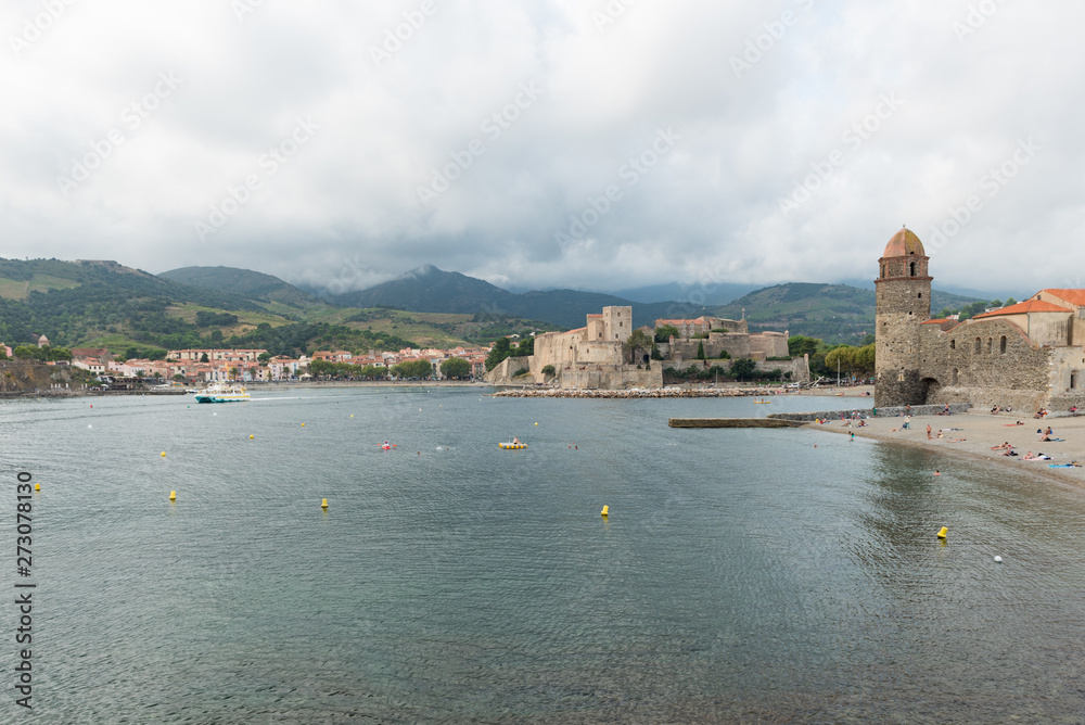 Old town of Collioure, France, a popular town on Mediterranean sea, view of the beach and church