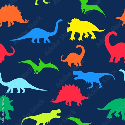 Seamless repeat pattern with colorful neon dinosaur silhouettes on a navy blue background