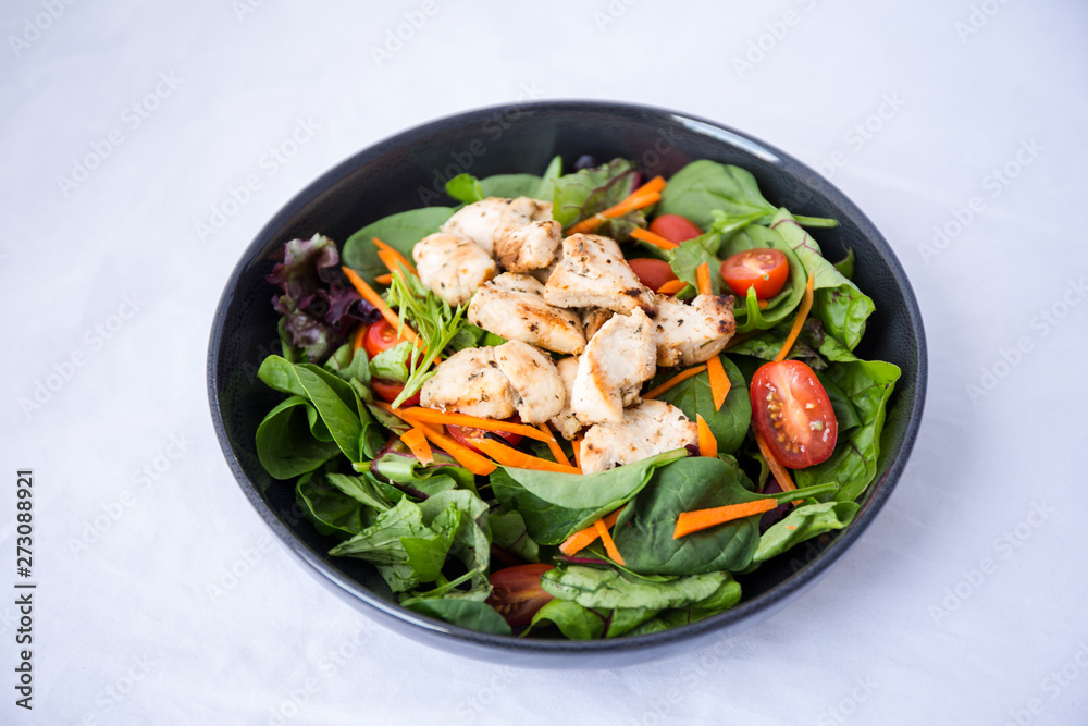 Green salad, tomatoes with grilled chicken Green salad, tomatoes with grilled chicken