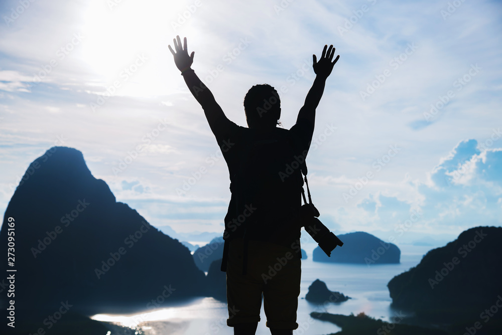 Fototapeta premium Men travel photography on the Mountain. Tourist on summer holiday vacation. Landscape Beautiful Mountain on sea at Samet Nangshe Viewpoint. Phang Nga Bay, Travel Thailand, Travel adventure nature.