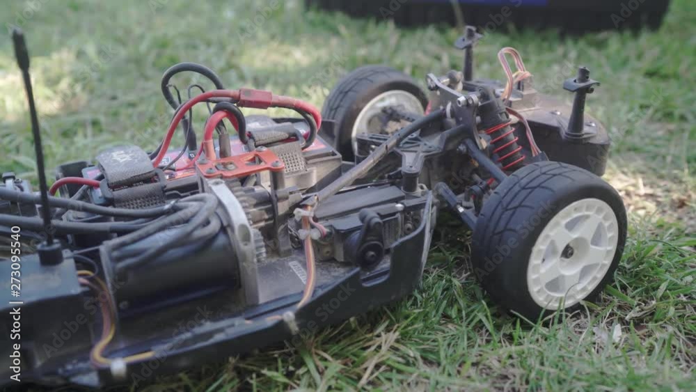 Checking the calibration and trimming of the remote controlled rc car's steering. Tires seems to work perfectly. Checking the calibration and trimming of the remote controlled rc car's steering. Tires seems to work perfectly.