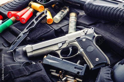 Weapons and military equipment. 9 mm pistol gun bullets and 12 gauge shotgun