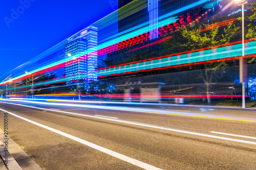 traffic with blur light through city at night.