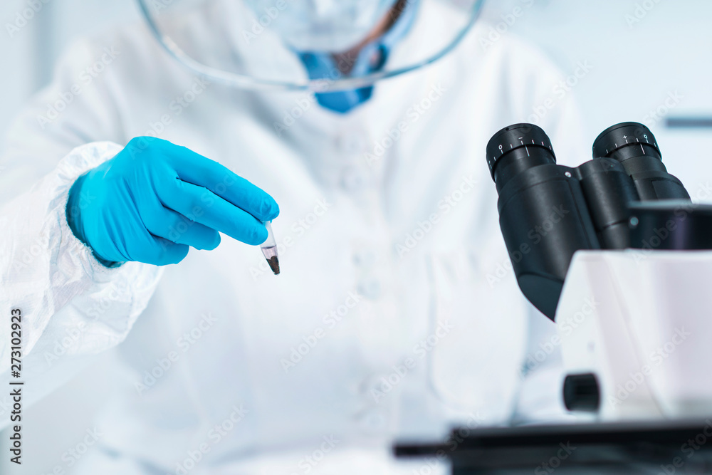 Fototapeta premium Ancient DNA Scientist Working in Bio Archaeology Lab