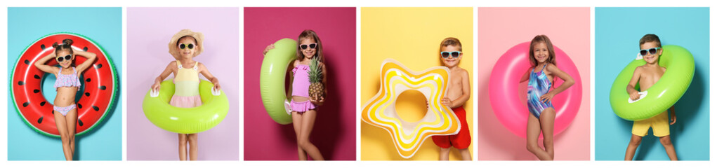 Set of cute little children with bright inflatable rings on color background