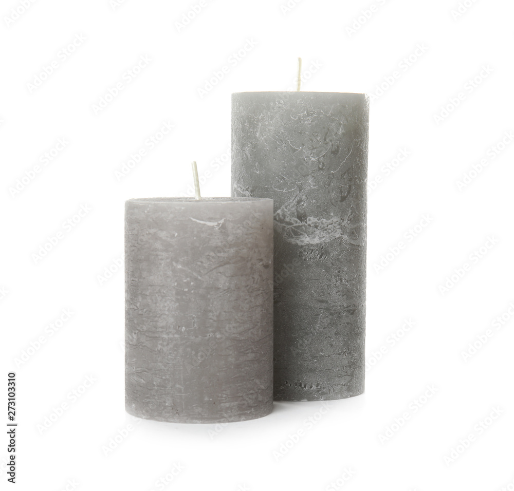 Two color wax candles on white background Two color wax candles on white background