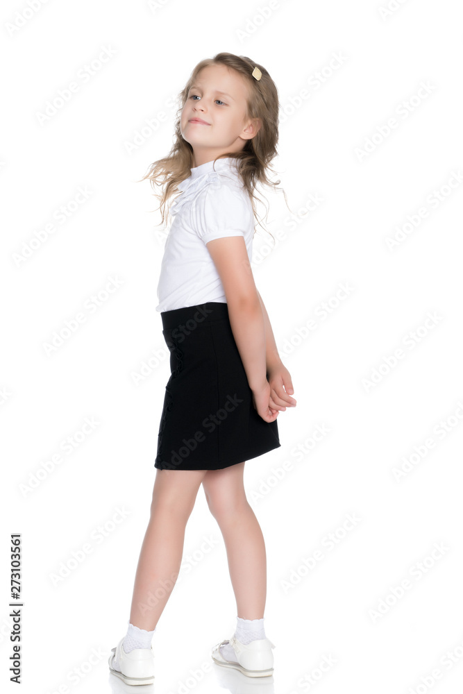 Fototapeta premium Fashionable little girl in a dress