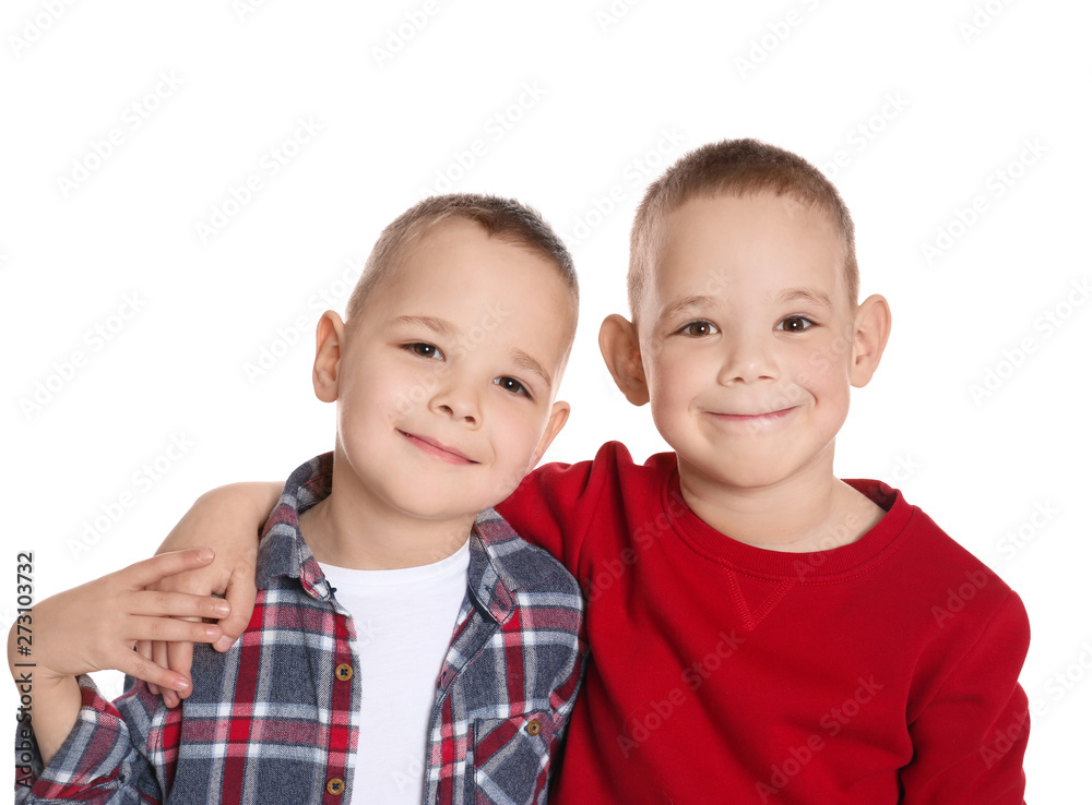 Portrait of cute twin brothers on white background Portrait of cute twin brothers on white background
