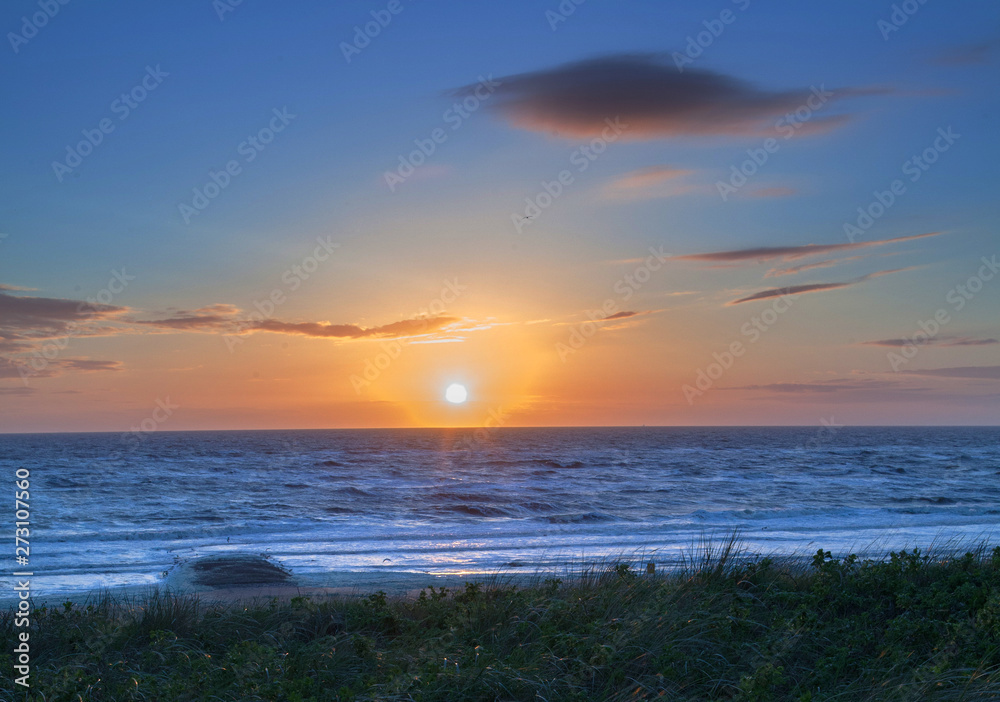 Sunset. Beach North sea coast Netherlands. Julianadorp,