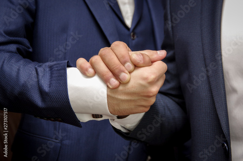 Handshake. Friendly handshakes. Man's hands. Partnership