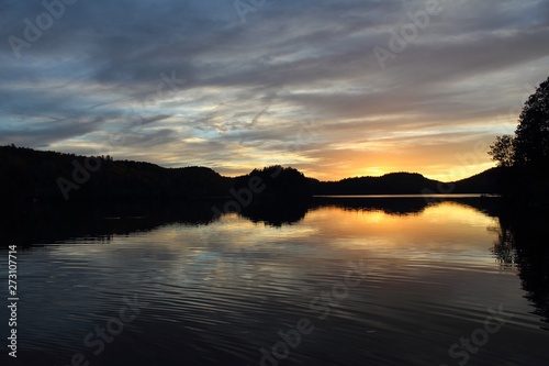 Blue  orange  yellow  sunset on lake