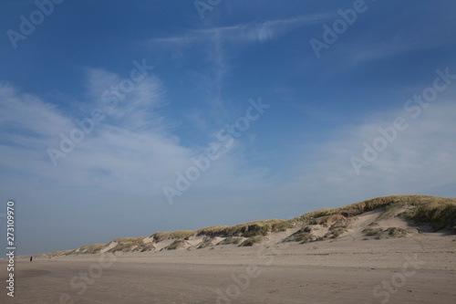 Dunes at Dutch coast. Northsea. Clouds and sky. Beach at Julianadorp Netherlands