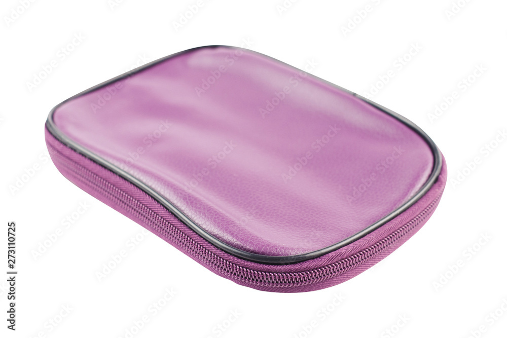 Modern closed cosmetic bag violet color with zipper isolated on white background Modern closed cosmetic bag violet color with zipper isolated on white background