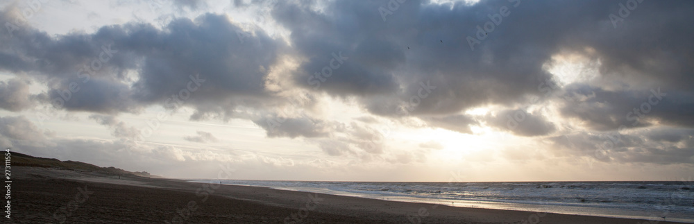 Dutch coast. Northsea. Clouds and sky. Sunset. Julianadorp. North Holland. 