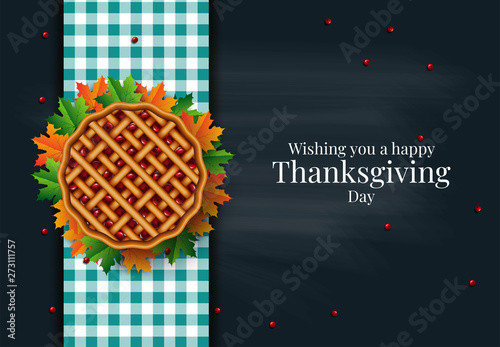 Thanksgiving dinner background with turkey and all sides dishes, pumpkin pie, fall leaves and seasonal autumnal decor on wooden background, top view, copy space