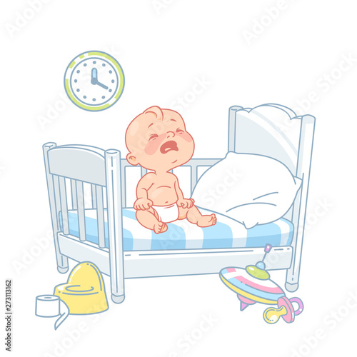 Cute little baby sit crying in bed.