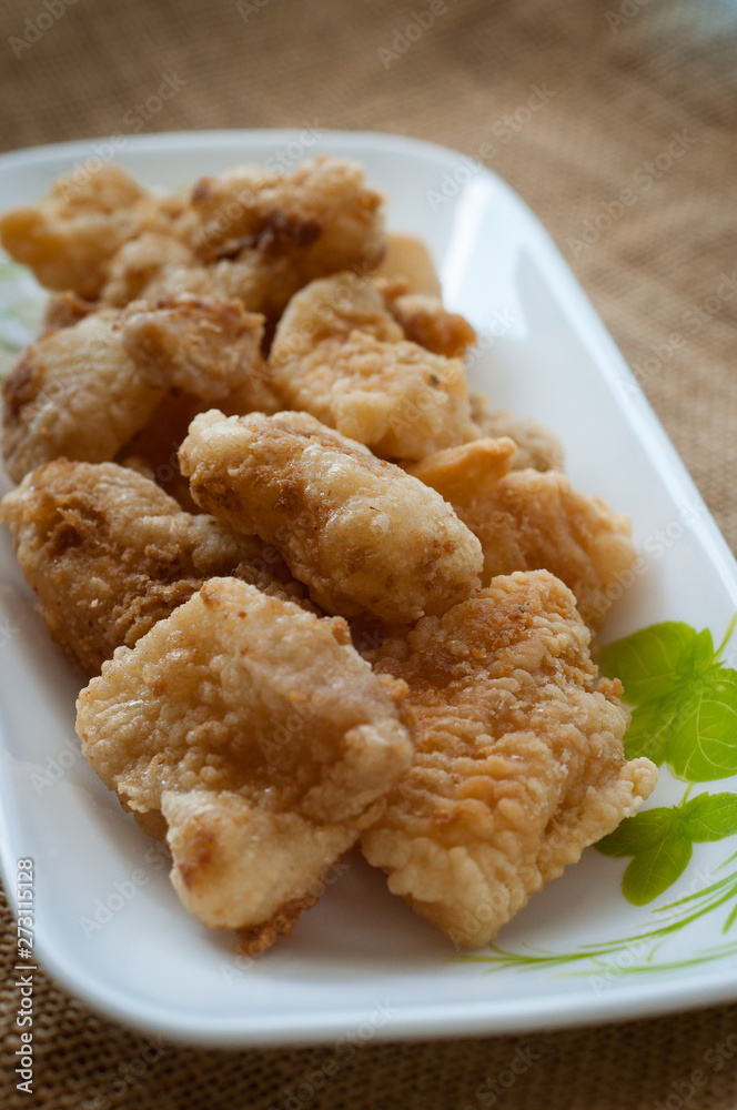 Malaysian style battered and deep fried dory fish cubes. Malaysian style battered and deep fried dory fish cubes.