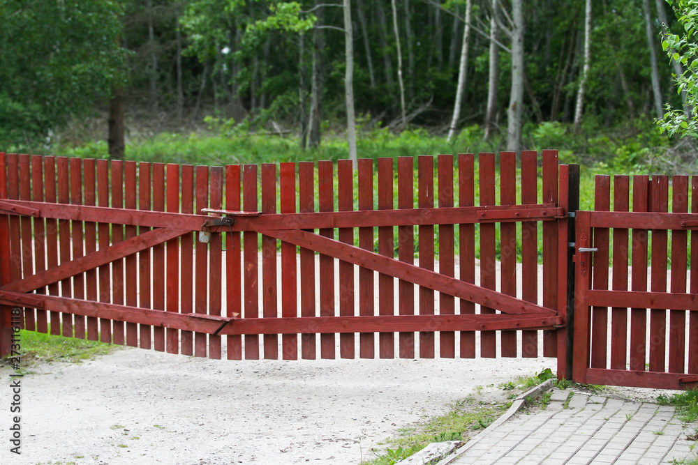 Beautiful view of red wood fence details in a countryside city details. Beautiful natural view.