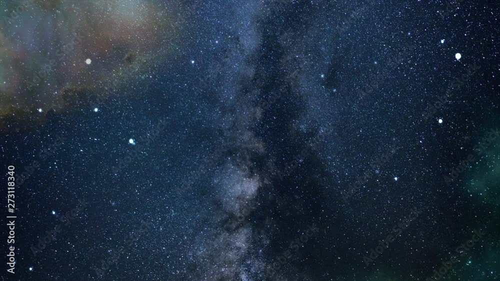 Flying among stars in a distant space. A 4K clip. Milky way galaxy in front. Interstellar travelling.