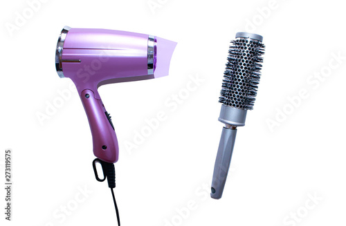  Professional hairdresser tools on white background.Pink hair dryer and brush. Beauty salon.