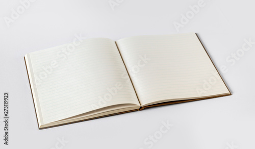 Open blank notebook isolated on grey