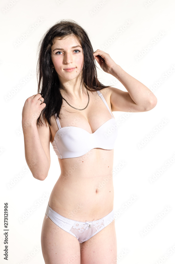 Young beautiful woman in a fashionable linen luxury brunette in the Studio Young beautiful woman in a fashionable linen luxury brunette in the Studio