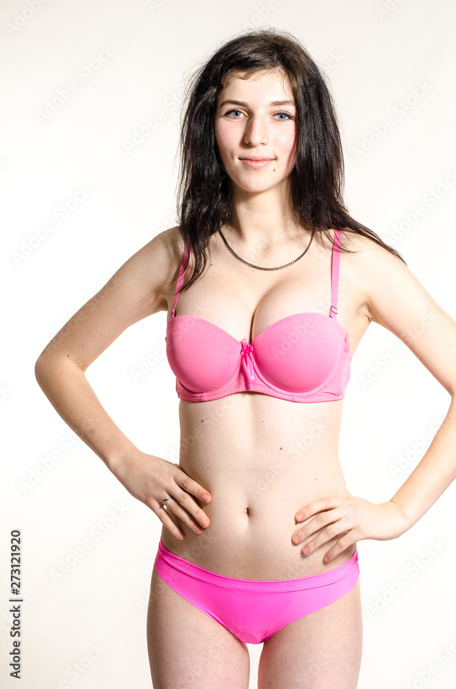 Young beautiful woman in a fashionable linen luxury brunette in the Studio Young beautiful woman in a fashionable linen luxury brunette in the Studio