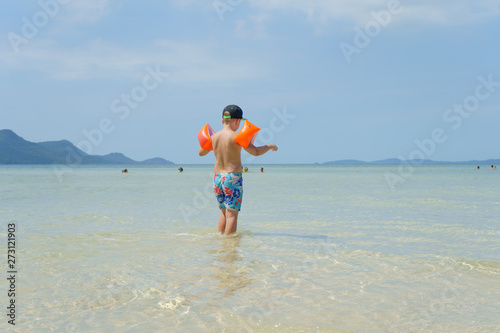 boy in swimming sleeves