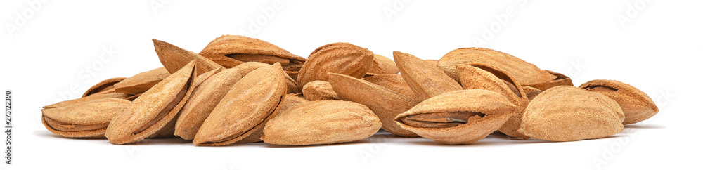 Almonds heap isolated on white background. Panorama of almonds unpeeled closeup. Nuts collection Almonds heap isolated on white background. Panorama of almonds unpeeled closeup. Nuts collection