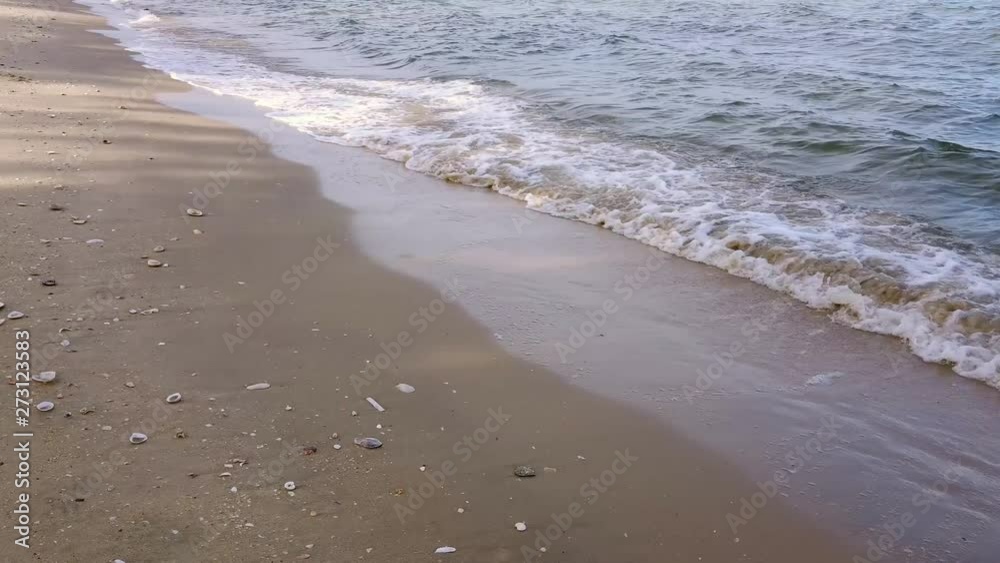 Waves in the ocean and sand on the beach, blue sky sunny day in Thailand