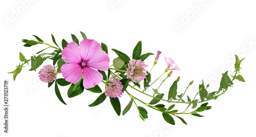 Wild pink flowers and green grass in a wave floral arrangement