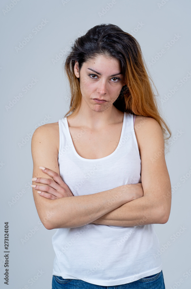 Human expressions and emotions. Desperate young attractive woman with angry face looking furious Human expressions and emotions. Desperate young attractive woman with angry face looking furious