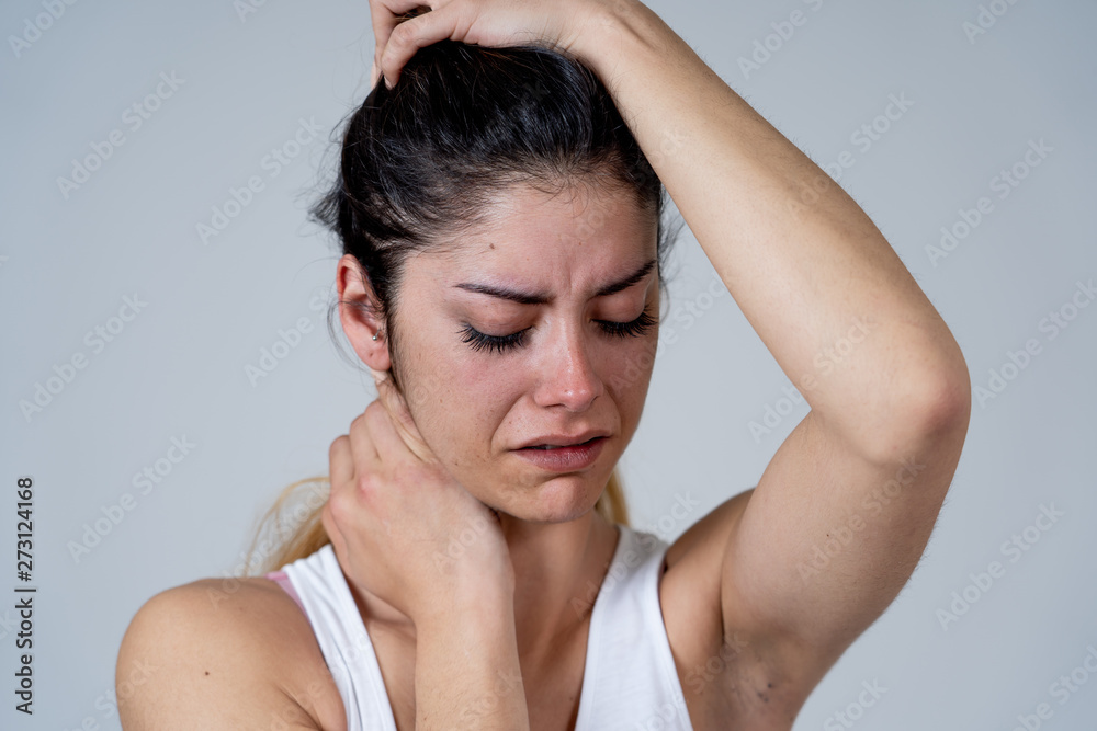 Young attractive woman sad and depressed feeling desperate. Human expressions and emotions Young attractive woman sad and depressed feeling desperate. Human expressions and emotions