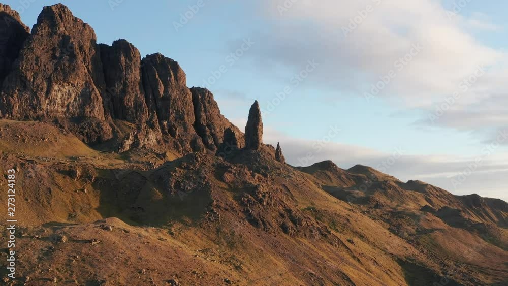 AERIAL: Flying up The Storr over The Old Man of Storr on the Isle of Skye, Scotland, UK AERIAL: Flying up The Storr over The Old Man of Storr on the Isle of Skye, Scotland, UK