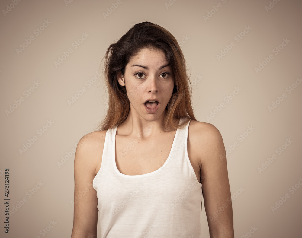 Happy young attractive woman shocked with surprised funny face. Human expressions Happy young attractive woman shocked with surprised funny face. Human expressions