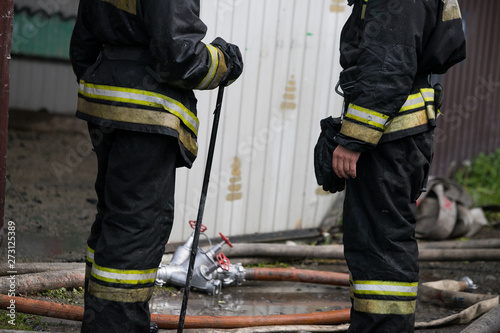 firefighters extinguish the fire house