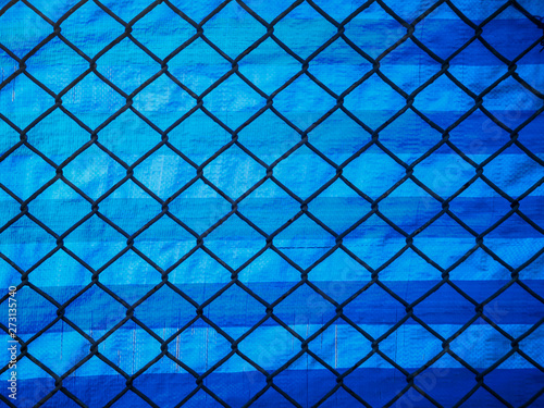 Steel Grating grid with canvas background.Grid iron grates.Grid pattern abstract background.