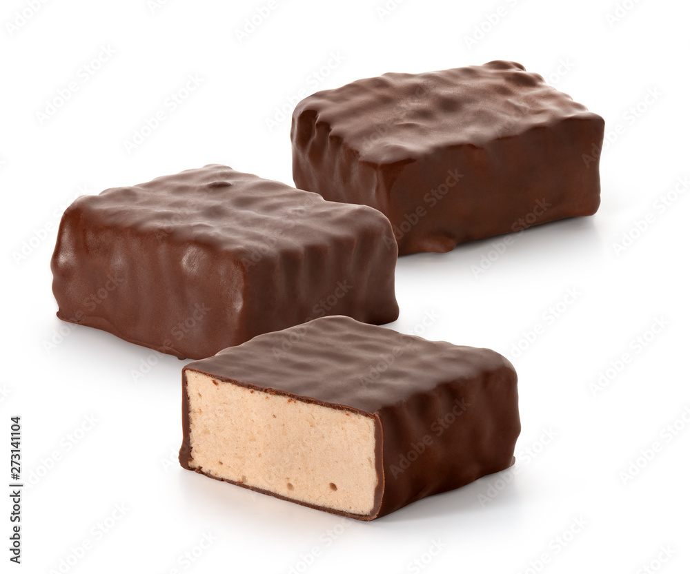 Candies whipped Cream in chocolate on a white background Candies whipped Cream in chocolate on a white background