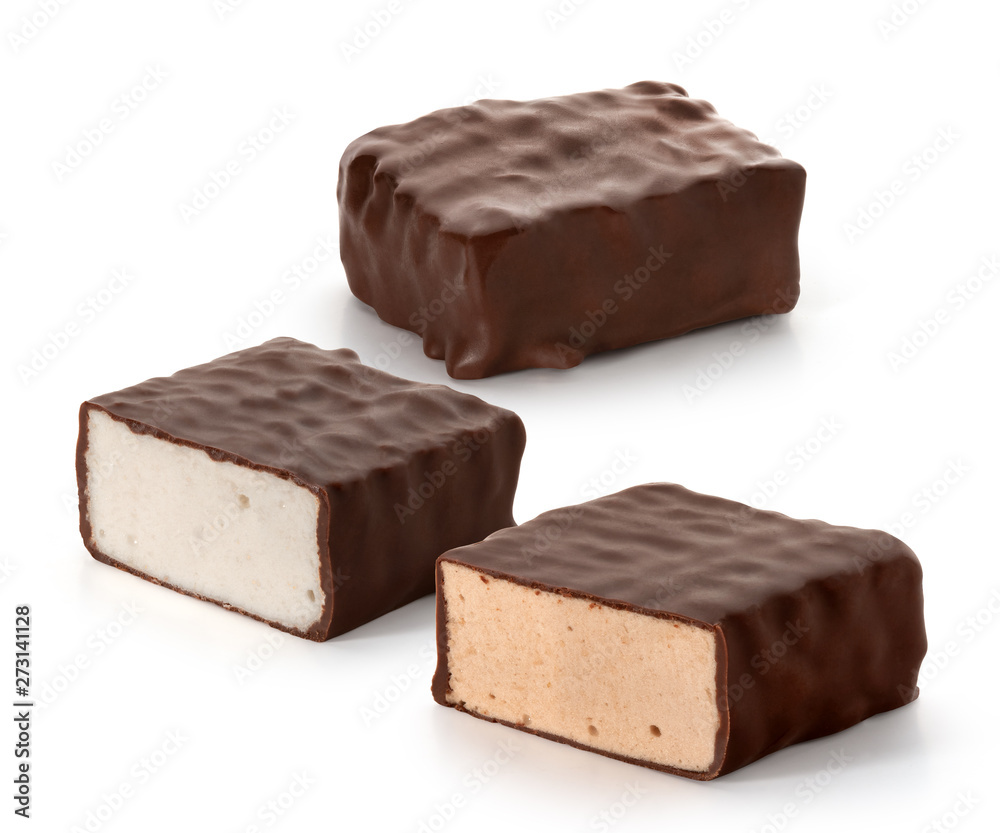 Candies whipped Cream in chocolate on a white background Candies whipped Cream in chocolate on a white background